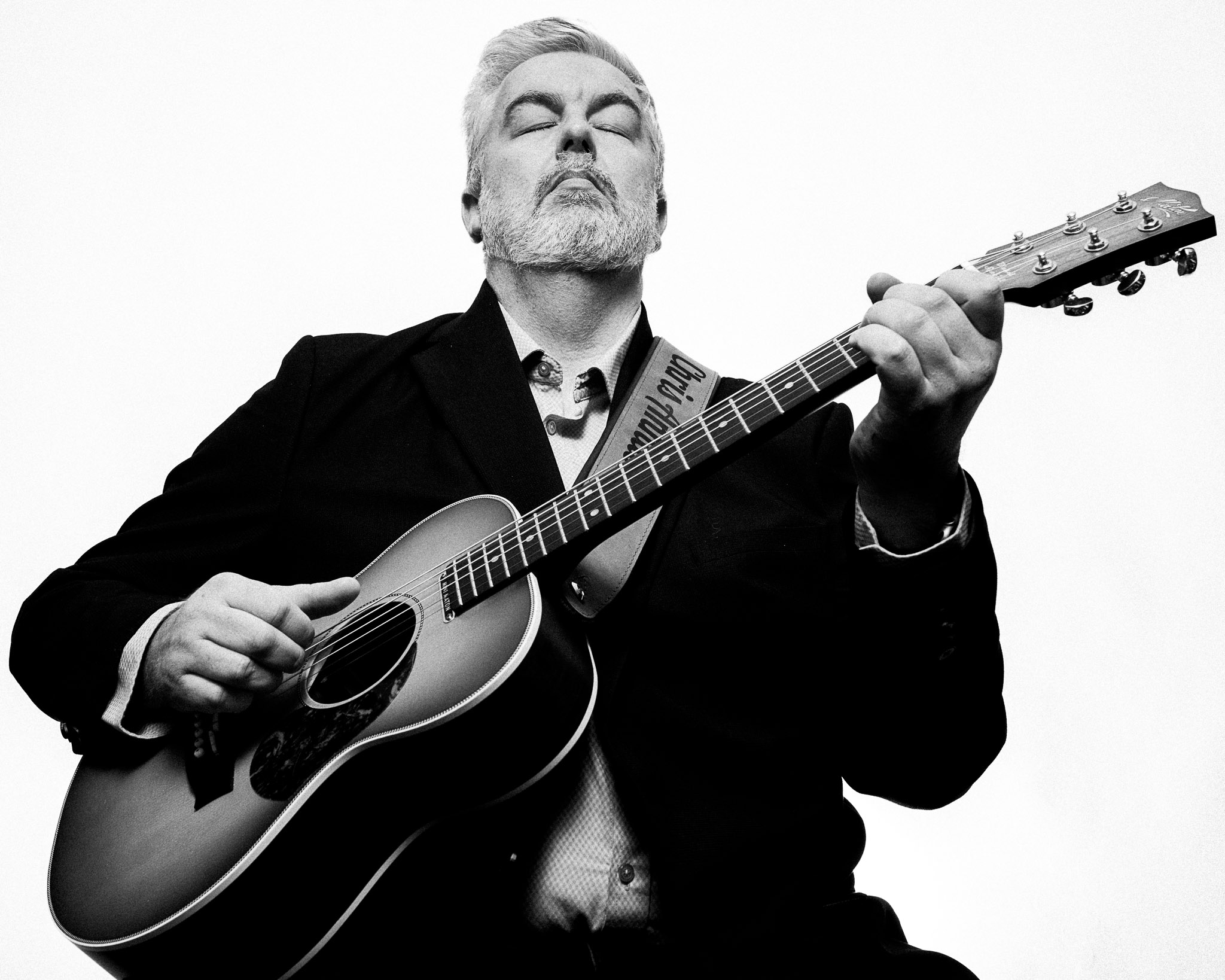 Black and white portrait of Chris Annable, guitarist photographed by Richard Mayle.