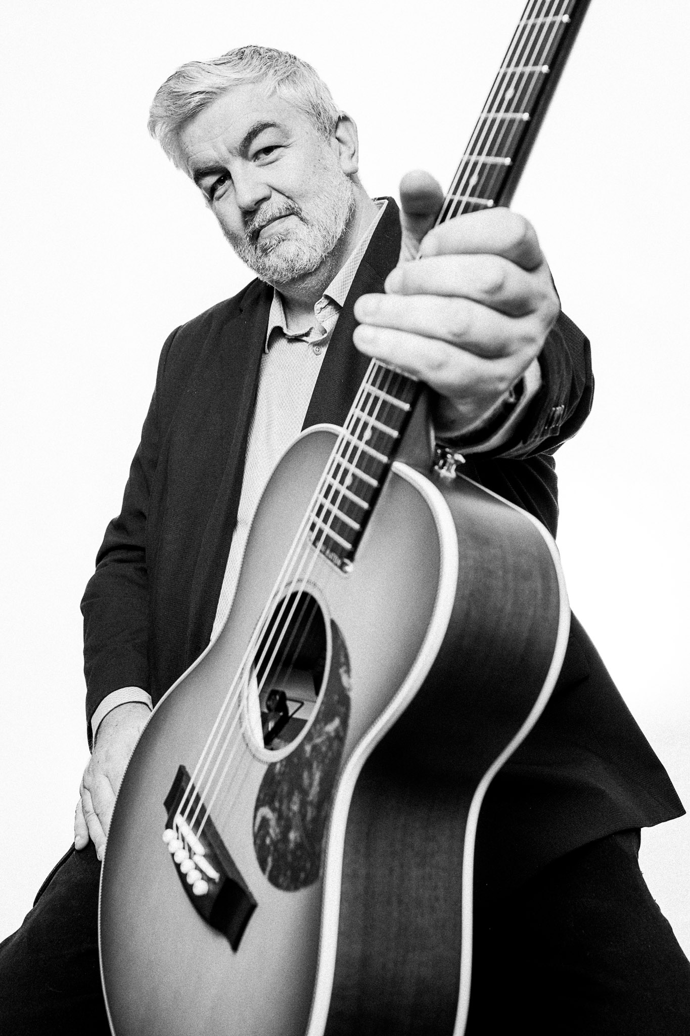 Black and white portrait of Chris Annable, guitarist photographed by Richard Mayle.
