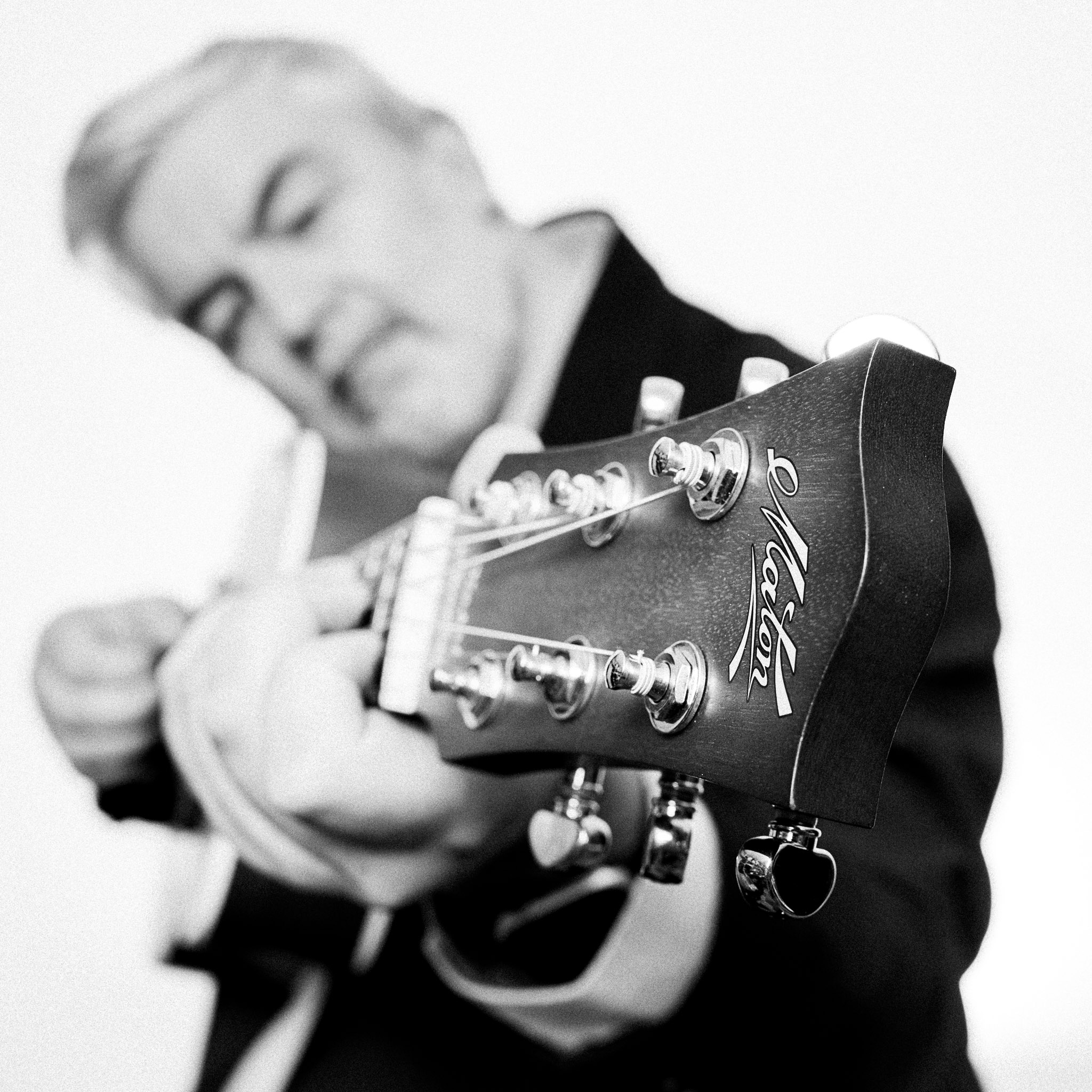 Black and white portrait of Chris Annable, guitarist photographed by Richard Mayle.