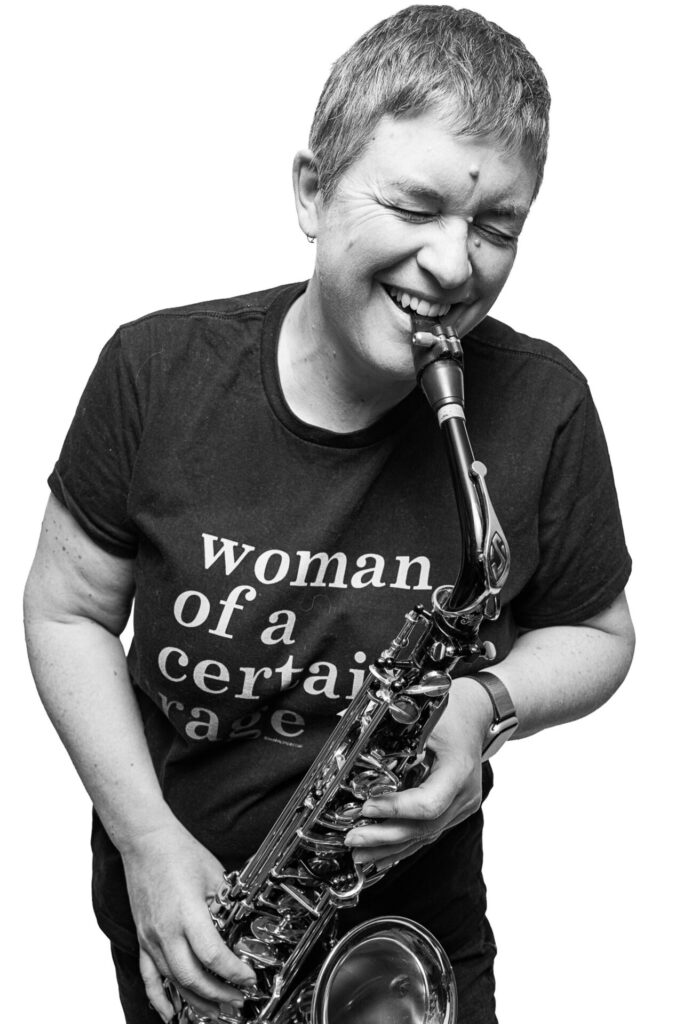 Black and white portrait of Jac, saxophonist photographed by Richard Mayle.